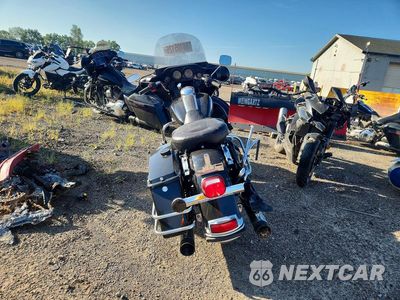 Czwarte zdjęcie samochodu z boku: 2012 HARLEY-DAVIDSON FLHTP POLICE ELECTRA GLIDE VIN:1HD1FMM17CB668592 - miniatura