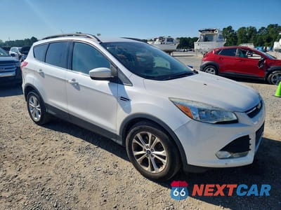 Czwarte zdjęcie samochodu z boku: 2016 FORD ESCAPE SE VIN:1FMCU9GX8GUA90893 - miniatura