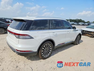 Trzecie zdjęcie samochodu z tyłu: 2022 LINCOLN AVIATOR RESERVE VIN:5LM5J7WC5NGL01934 - miniatura