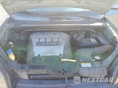 Zdjęcie 12 z 13 samochodu: 2006 HYUNDAI TUCSON GLS VIN:KM8JN12D96U463330 - miniatura