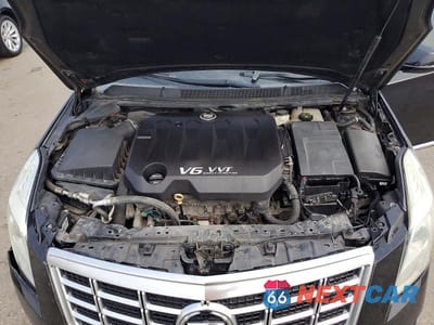 Zdjęcie 12 z 13 samochodu: 2015 CADILLAC XTS LIMOUSINE VIN:2GEXG6U38F9550036 - miniatura
