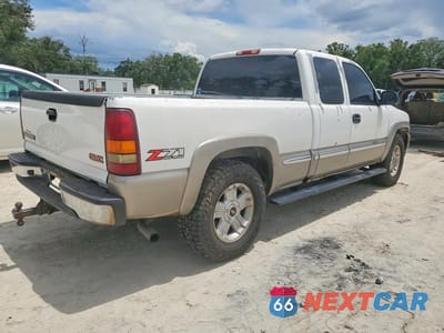 Trzecie zdjęcie samochodu z tyłu: 2002 GMC NEW SIERRA K1500 VIN:2GTEK19T821345108 - miniatura