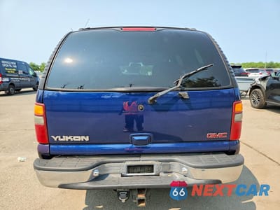 Zdjęcie 6 z 13 samochodu: 2001 GMC YUKON VIN:1GKEK13T51J145076 - miniatura