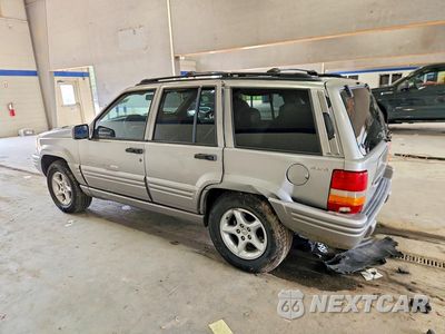Trzecie zdjęcie samochodu z tyłu: 1998 JEEP GRAND CHEROKEE LIMITED 5.9L VIN:1J4GZ88Z8WC118109 - miniatura