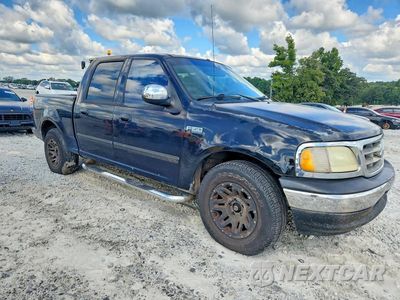 Czwarte zdjęcie samochodu z boku: 2001 FORD F150 SUPERCREW VIN:1FTRW07L81KB86589 - miniatura