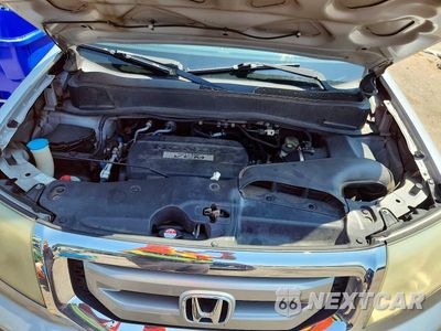 Zdjęcie 11 z 12 samochodu: 2010 HONDA PILOT EXL VIN:5FNYF3H61AB008350 - miniatura