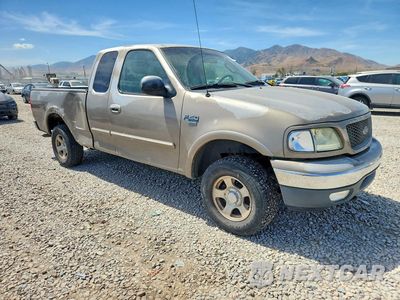 Czwarte zdjęcie samochodu z boku: 2002 FORD F150 VIN:1FTRX18L02NB60389 - miniatura