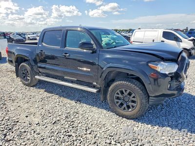 Czwarte zdjęcie samochodu z boku: 2023 TOYOTA TACOMA SR5 V6 VIN:3TMCZ5AN7PM548983 - miniatura