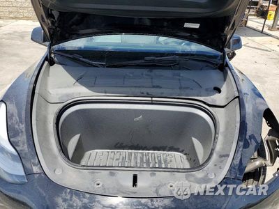 Zdjęcie 11 z 12 samochodu: 2023 TESLA MODEL Y VIN:7SAYGDEE0PF882439 - miniatura