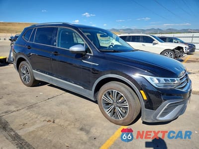 Czwarte zdjęcie samochodu z boku: 2024 VOLKSWAGEN TIGUAN WOLFSBURG VIN:3VV5B7AX0RM227480 - miniatura