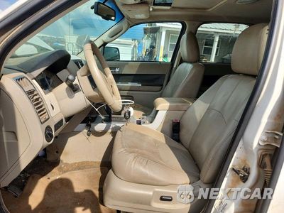 Zdjęcie 7 z 13 samochodu: 2010 MERCURY MARINER PREMIER VIN:4M2CN8HG8AKJ27982 - miniatura