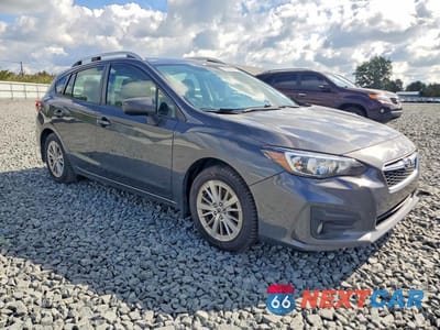 Czwarte zdjęcie samochodu z boku: 2018 SUBARU IMPREZA PREMIUM VIN:4S3GTAB6XJ3745044 - miniatura
