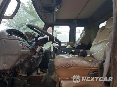 Zdjęcie 7 z 13 samochodu: 1999 UD UD2300 REFUSE TRUCK VIN:JNALC43H4XGN50061 - miniatura