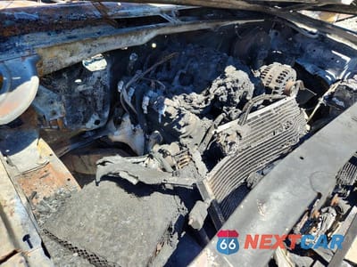 Zdjęcie 12 z 13 samochodu: 2003 GMC YUKON XL C1500 VIN:1GKEC16T83J244213 - miniatura
