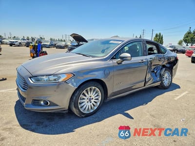 2014 FORD FUSION SE PHEV 3FA6P0PUXER256237 - główne zdjęcie licytacji z USA - miniatura