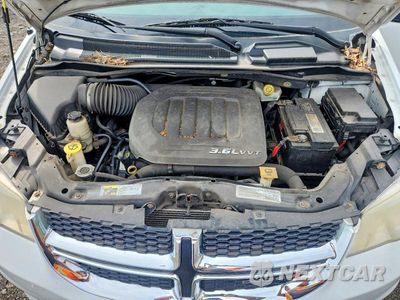 Zdjęcie 12 z 13 samochodu: 2014 DODGE GRAND CARAVAN SE VIN:2C4RDGBG4ER361954 - miniatura