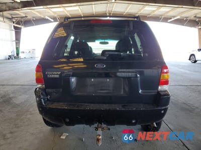 Zdjęcie 6 z 14 samochodu: 2003 FORD ESCAPE LIMITED VIN:1FMCU04173KA05172 - miniatura