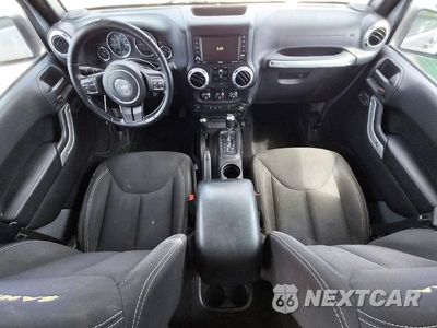 Zdjęcie 8 z 13 samochodu: 2015 JEEP WRANGLER UNLIMITED SAHARA VIN:1C4BJWEG9FL649981 - miniatura