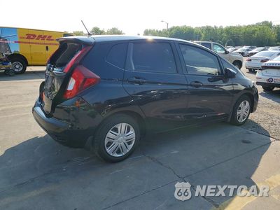 Trzecie zdjęcie samochodu z tyłu: 2018 HONDA FIT LX VIN:3HGGK5H41JM736555 - miniatura