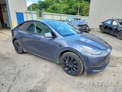 Czwarte zdjęcie samochodu z boku: 2022 TESLA MODEL Y VIN:7SAYGDEE3NF480797 - miniatura