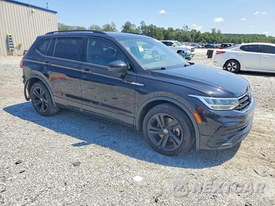 Czwarte zdjęcie samochodu z boku: 2024 VOLKSWAGEN TIGUAN SE R-LINE BLACK VIN:3VVCB7AX8RM059921 - miniatura