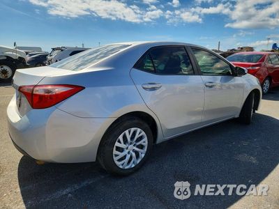Trzecie zdjęcie samochodu z tyłu: 2019 TOYOTA COROLLA L VIN:5YFBURHE5KP864925 - miniatura
