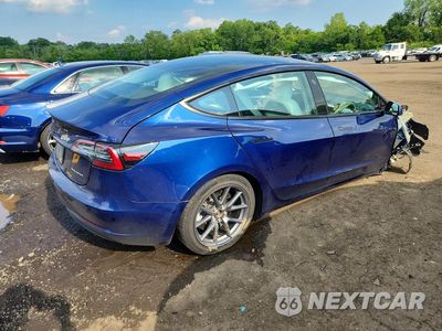 Trzecie zdjęcie samochodu z tyłu: 2023 TESLA MODEL 3 VIN:5YJ3E1EB5PF627593 - miniatura