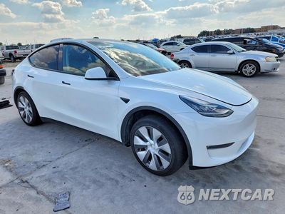 Czwarte zdjęcie samochodu z boku: 2023 TESLA MODEL Y VIN:7SAYGDEEXPA110933 - miniatura