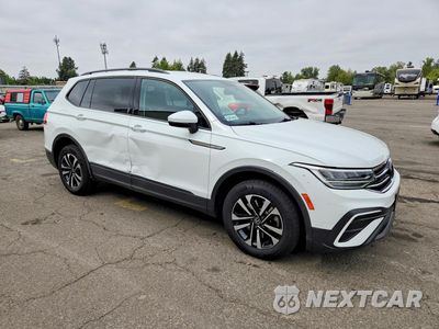 Czwarte zdjęcie samochodu z boku: 2022 VOLKSWAGEN TIGUAN S VIN:3VV0B7AX1NM077223 - miniatura