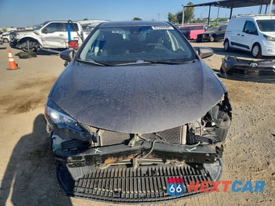 Piąte zdjęcie samochodu w środku: 2017 TOYOTA COROLLA LE VIN:5YFBURHE4HP702776 - miniatura