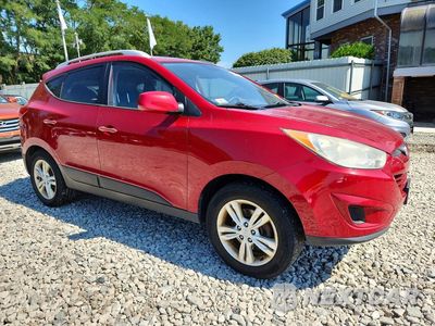 Czwarte zdjęcie samochodu z boku: 2010 HYUNDAI TUCSON GLS VIN:KM8JUCAC6AU042472 - miniatura