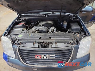 Zdjęcie 12 z 13 samochodu: 2009 GMC YUKON XL K1500 SLE VIN:1GKFK26349R205710 - miniatura