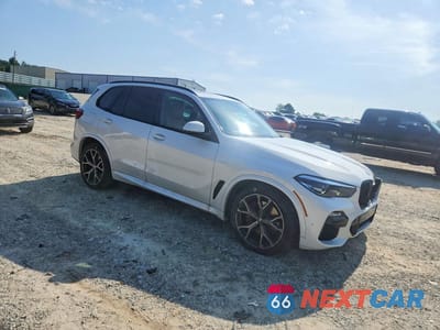 Czwarte zdjęcie samochodu z boku: 2021 BMW X5 SDRIVE 40I VIN:5UXCR4C09M9H72022 - miniatura