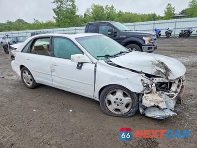 Czwarte zdjęcie samochodu z boku: 2003 TOYOTA AVALON XLS VIN:4T1BF28B93U331712 - miniatura