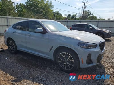 Czwarte zdjęcie samochodu z boku: 2024 BMW X4 XDRIVE30I VIN:5UX33DT05R9T69547 - miniatura