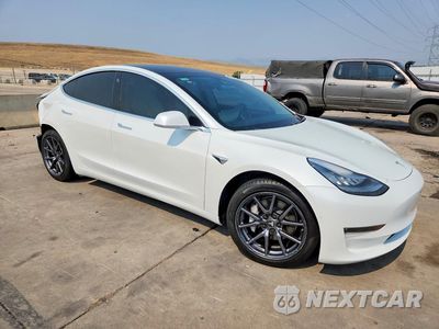 Czwarte zdjęcie samochodu z boku: 2020 TESLA MODEL 3 VIN:5YJ3E1EB9LF651633 - miniatura