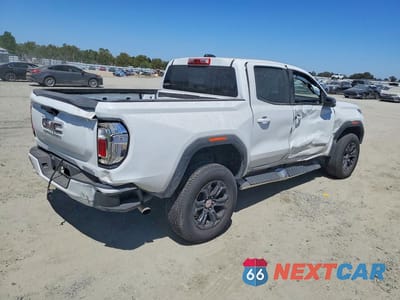 Trzecie zdjęcie samochodu z tyłu: 2024 GMC CANYON ELEVATION VIN:1GTP5BEK6R1131687 - miniatura