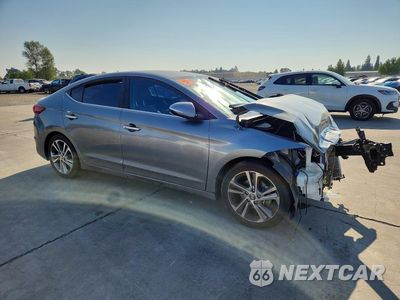 Czwarte zdjęcie samochodu z boku: 2017 HYUNDAI ELANTRA LIMITED VIN:KMHD84LF3HU152128 - miniatura