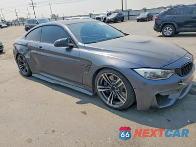Czwarte zdjęcie samochodu z boku: 2018 BMW M4 VIN:WBS4Y9C53JAG66718 - miniatura