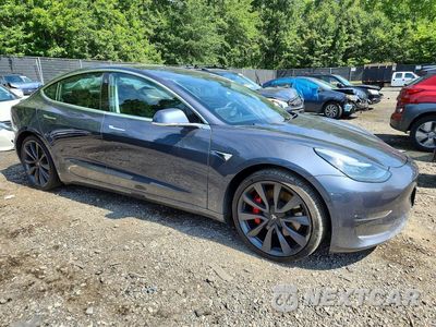 Czwarte zdjęcie samochodu z boku: 2020 TESLA MODEL 3 VIN:5YJ3E1EC9LF640897 - miniatura