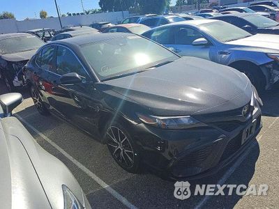 Czwarte zdjęcie samochodu z boku: 2024 TOYOTA CAMRY SE VIN:4T1G11AK0RU865778 - miniatura