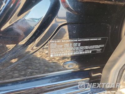 Zdjęcie 12 z 12 samochodu: 2014 BMW 750 LI VIN:WBAYE8C5XED134487 - miniatura