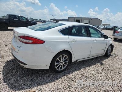 Trzecie zdjęcie samochodu z tyłu: 2017 FORD FUSION SE HYBRID VIN:3FA6P0LU1HR359542 - miniatura