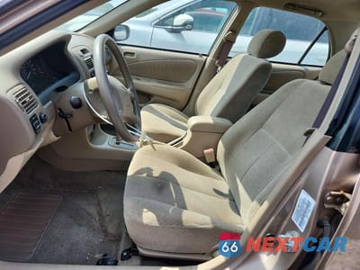 Zdjęcie 7 z 13 samochodu: 2002 TOYOTA COROLLA LE VIN:2T1BR12E72C527412 - miniatura