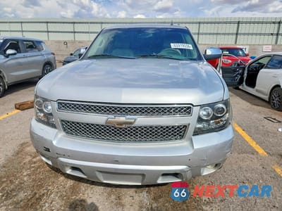 Piąte zdjęcie samochodu w środku: 2010 CHEVROLET SUBURBAN K1500 LT VIN:1GNUKJE30AR273450 - miniatura