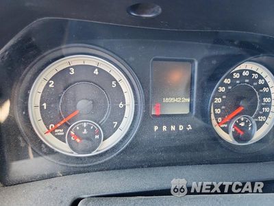 Zdjęcie 9 z 11 samochodu: 2013 RAM 1500 SLT VIN:1C6RR6GP1DS594022 - miniatura