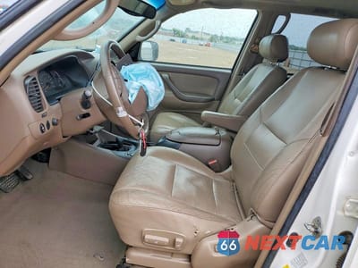 Zdjęcie 7 z 13 samochodu: 2003 TOYOTA SEQUOIA SR5 VIN:5TDBT44A03S157815 - miniatura
