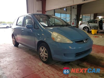 Czwarte zdjęcie samochodu z boku: 2007 HONDA FIT VIN:JHMGD37467S066952 - miniatura