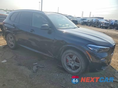 Czwarte zdjęcie samochodu z boku: 2021 BMW X5 VIN:5UXCR6C08M9H68653 - miniatura