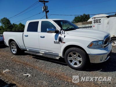 Czwarte zdjęcie samochodu z boku: 2016 RAM 1500 LONGHORN VIN:1C6RR7WM3GS319012 - miniatura
